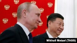 Сі Цзіньпін і Володимир Путін під час зустрічі у Москві. Липень 2017 року