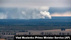 There have been several explosions and fires at arms depots in Ukraine in recent years. This blast at a munitions depot near the town of Ichnya in October prompted the evacuation of thousands of people. (file photo)