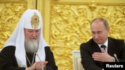 Патриарх Кирилл һәм Владимир Путин