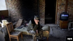 Ukraine -- A Ukrainian soldier waits for orders from Kyiv, during the preparations to repel the attack of Crimea's self-defense units in the last Ukrainian military base, which has not surrendered after the annexation of Crimea by Russia in Belbek, Crimea
