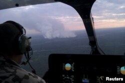 Пожежа у зоні відчуження (40 кілометрів від ЧАЕС) з висоти пташиного польоту. 29 червня 2015 року