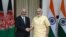 Afghan President, Asharf Ghani (L) and Indian Prime Minister Narendra Modi shake hands prior to a meeting in New Delhi, September 14, 2016