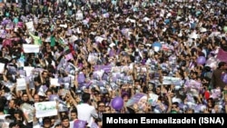 Supporters of Hassan Rouhani in a campaign rally in Mashhad, on Wednesday My 17, 2017. 