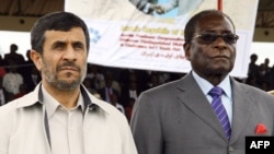 Zimbabwean President Robert Mugabe (right) with former Iranian President Mahmud Ahmadinejad (file photo) 