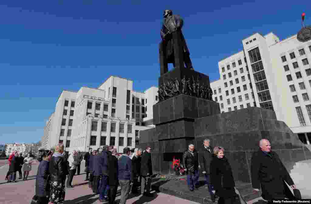 Communist Party supporters in Minsk lay flowers at a monument to Vladimir Lenin, the founder of the Soviet Union, to mark the 150th anniversary of his birth on April 22.