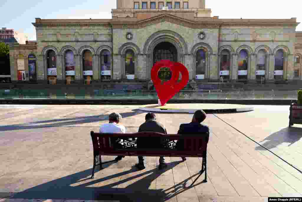 Weary men sitting in the sun on Republic Square in downtown Yerevan. After the ruling Republican Party (HHK) indicated that it would support Pashinain for prime minister in a May 8 parliamentary vote, the protest leader effectively told his supporters to stand down until then. 