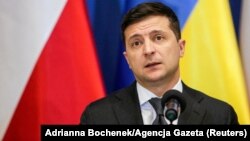 Ukrainian President Volodymyr Zelenskiy: "Of course, human life is not measured by money, but we will push for more" compensation for families of the victims. (file photo)