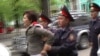 Kazakh Sues Over Imprisonment