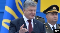 Ukrainian President Petro Poroshenko speaks during Independence Day celebrations in Kyiv on August 24: “The enemy has failed...to bring Ukraine to its knees,” he said. 