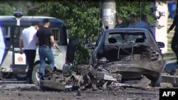 Mahaçgalanyň merkezinde bomba partladylan ýer, 20-nji maý, 2013.