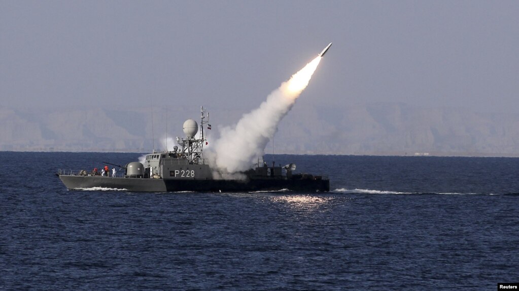 A medium-range missile is test-fired by Iran near the Strait of Hormuz in 2012.