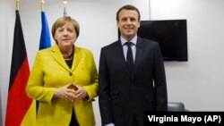 Angela Merkel i Emanuel Makron