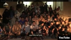 A screen grab shows dozens of purported Kazakh fighters in Syria.