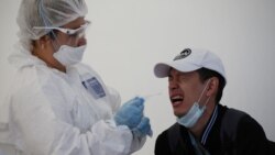 Алматыдағы COVID-19 ауруының бар-жоғын анықтайтын мобильді тестілеу орталығында. 2020 жылдың маусым айы. Көрнекі сурет.