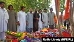 The grave of Mashal Khan, who was murdered by a mob earlier this year after being accused of online blasphemy.