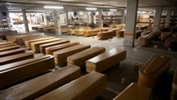 Preminuli od korona virusa u kovčezima pred sahranu u Barseloni