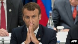 Президент Франции Эммануэль Макрон на встрече по цифровой экономике на саммите G20 в Осаке.