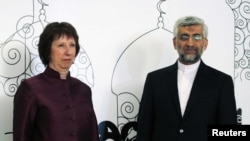 European Union foreign policy chief Catherine Ashton (left) and Iran's chief nuclear negotiator Saeed Jalili at a meeting in Baghdad earlier this year. 