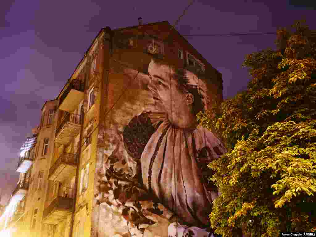 Lilly Of The Valley, a portrait of the Ukrainian poet and activist known as Lesya Ukrainka, by Guido van Helten.