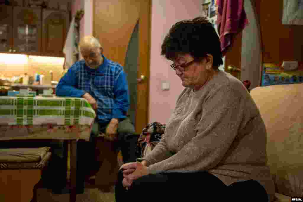 Munir (left) and Zarema Alivapov in their kitchen in Alupka, Crimea. Their son Muedin was arrested on charges of setting fire to cars, but his family denies the allegations, saying their son&#39;s detention was politically motivated. A string of arson cases, possibly gang-related, has continued since Muedin&#39;s arrest.&nbsp;