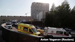 Ambulances line up outside the I.I. Dzhanelidze Research Institute of Emergency Medicine in St. Petersburg in June.