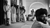 Outside the front door of the late tribal leader Nawab Akbar Khan Bugti's home, several Bugti tribesmen stand guard, while others wait for an audience with their chieftain (file photo).