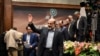 Head of Iran's state-run TV IRIB, Abdol-Ali Ali-Asgari (C), alongside other Iranian officials in the opening ceremony of Iran-Kala channel, on March 04, 2018.