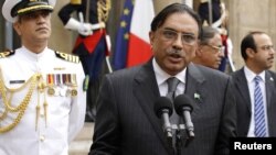 Pakistan's President Asif Ali Zardari speaks to journalists after a meeting with France's President Nicolas Sarkozy in Paris.