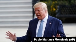 U.S. President Donald Trump speaks to the media on the South Lawn of the White House in Washington, October 4, 2019,