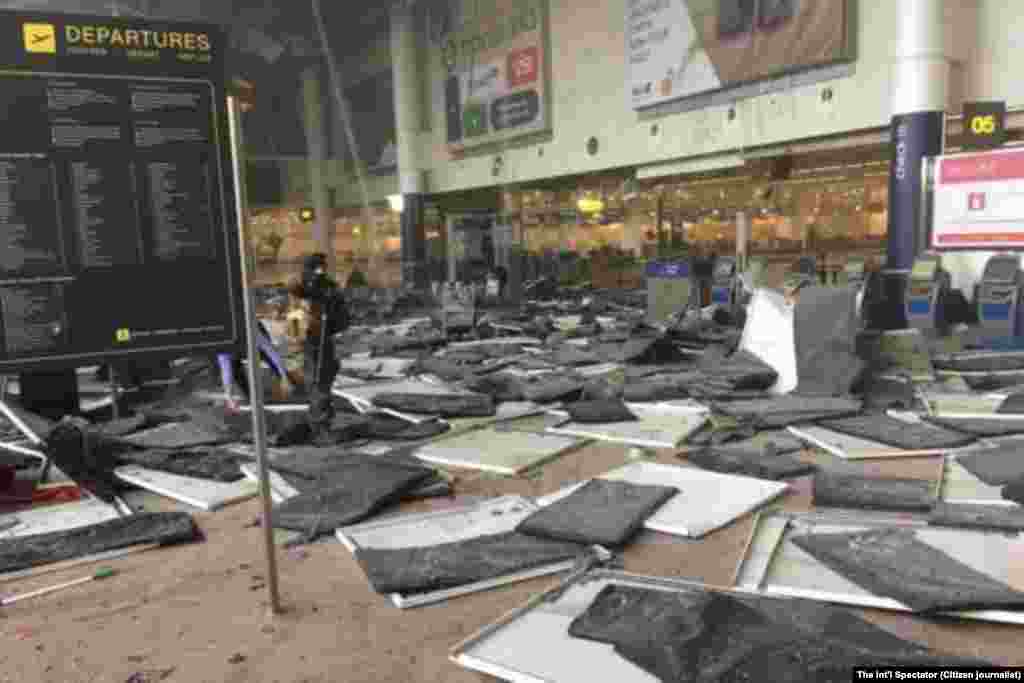 The blasts occurred near the American Airlines counter in the departures lounge.