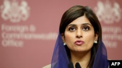 U.K. -- Pakistan's Foreign Minister Hina Rabbani Khar addresses a press conference with Britain's Foreign Secretary William Hague (not pictured) at the Foreign and Commonwealth Office in central London, 21Feb2012