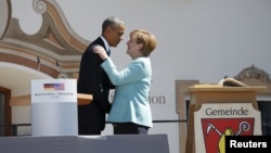 Президент США Барак Обама і канцлер Німеччини Анґела Меркель, селище Крун, Баварія, 7 червня 2015 року