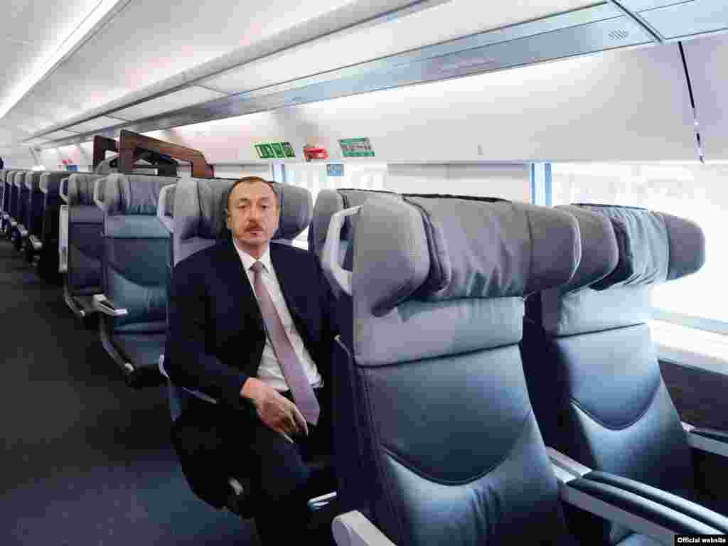 Azerbaijani President Ilham Aliyev tests out a new rail line connecting Baku and Sumgait.