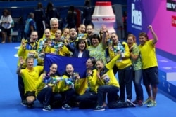 Збірна України святкує перемогу на світовій першості