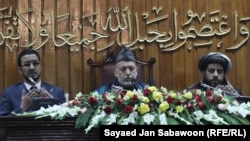 Afghan President Hamid Karzai (center), seen praying during the opening ceremony of the second year of the Afghanistan parliament in January, was said to be angered by the Qatar initiative.