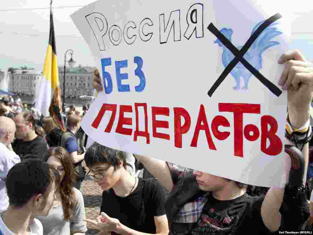 Activists hold a demonstration to protest a gay-pride parade in Moscow on May 21, 2011. The placard reads: &quot;Russia Without Pederasts.&quot;