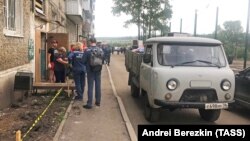 Спасатели эвакуируют жителей города Тулун в Иркутской области. 25 июля 2019 года.