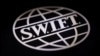 Попавшие под санкции российские банки отключат от системы SWIFT