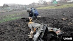 На месте пожара и взрывов на территории военных складов в Балаклее. 24 марта 2017 года.