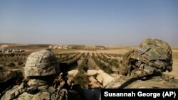 Американские военные в сирийском Манбидже. 7 февраля 2018 года.