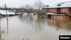 Pamje nga vërshimet në pjesën perëndimore të Kosovës në vitin 2013