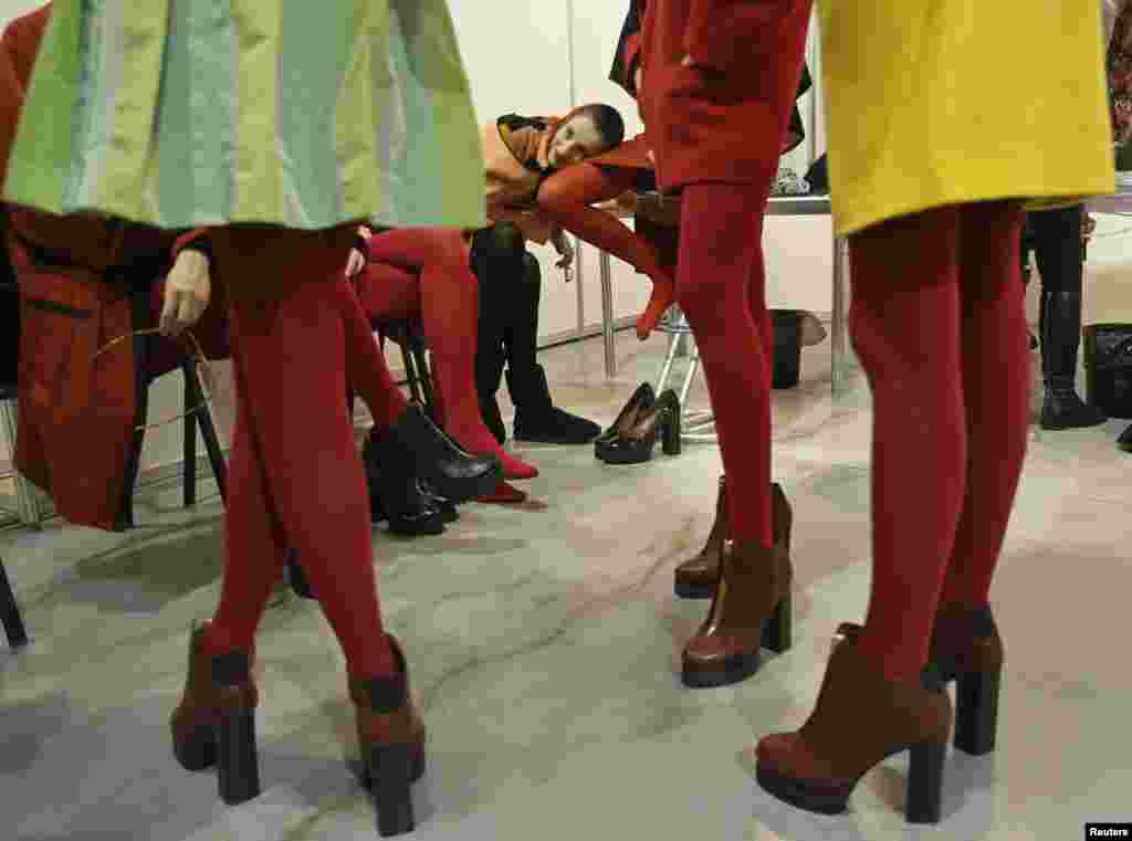 Models wait backstage during Ukrainian Fashion Week in Kyiv. (Reuters/Gleb Garanich)