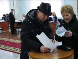Abdumanap Rustavletov, a 68-year-old retiree, casts his ballot. "The future is with the young ones," he said.