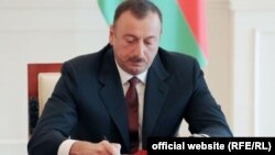 Ilham Aliyev sign