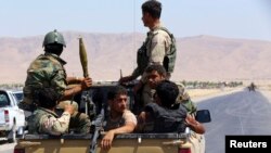 Pjesëtarë të njësiteve kurde që luftojnë kundër militantëve të Shtetit Islamik në Irak