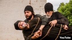 Yuri Arabovun Rus Provaslav kilsəsini tənqid edən "Rahibə və cin" filmindən bir səhnə.