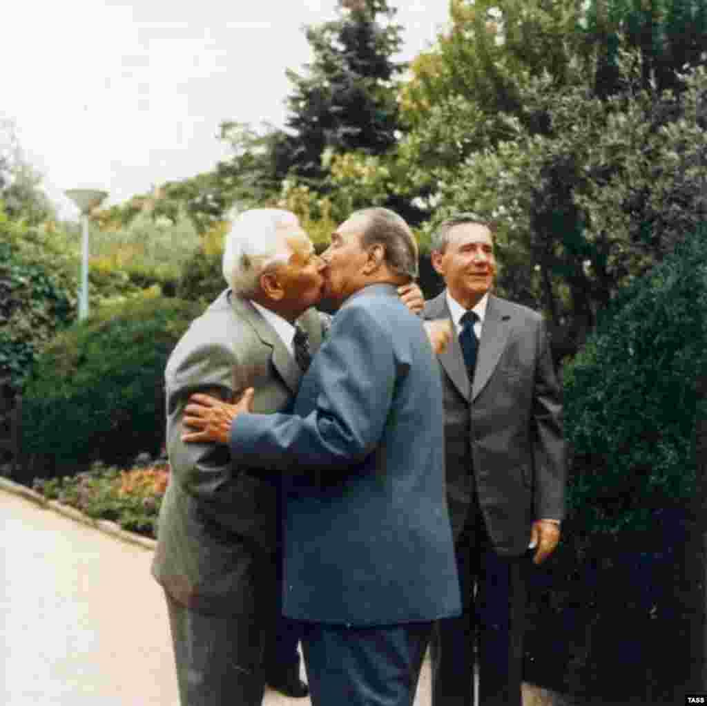 And no one kissed like Soviet leader Leonid Brezhnev, pictured (center) greeting communist heart-throb Konstantin Chernenko in Crimea in 1980.