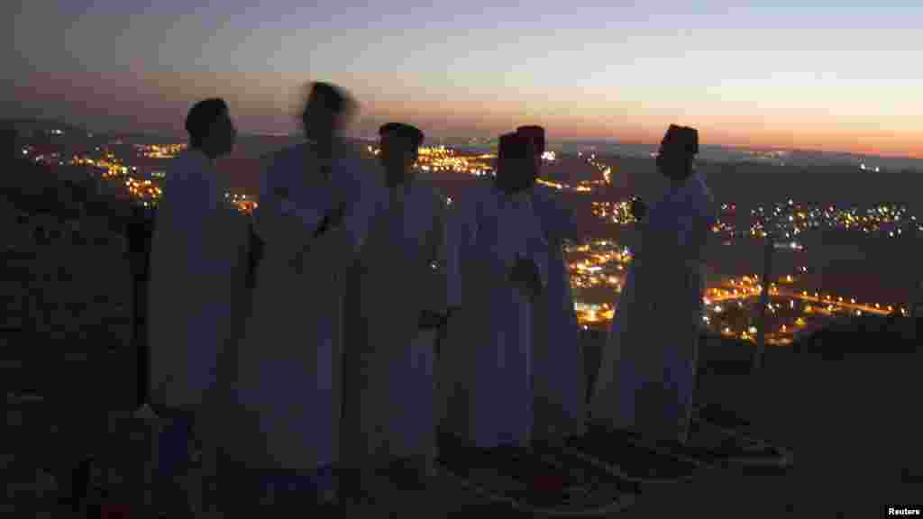 OCTOBER 29, 2012 -- Members of the Samaritan community take part in a traditional pilgrimage marking the holiday of Sukkot, or Feast of Tabernacles, atop Mount Gerizim near the West Bank city of Nablus. (Reuters/Baz Ratner)