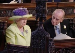 Королева Елизавета II и ее муж Филипп, герцог Эдинбургский, на свадьбе принца Гарри и Меган Маркл, май 2018 года