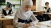Tatarstan -- School girl in a headscarf, undated